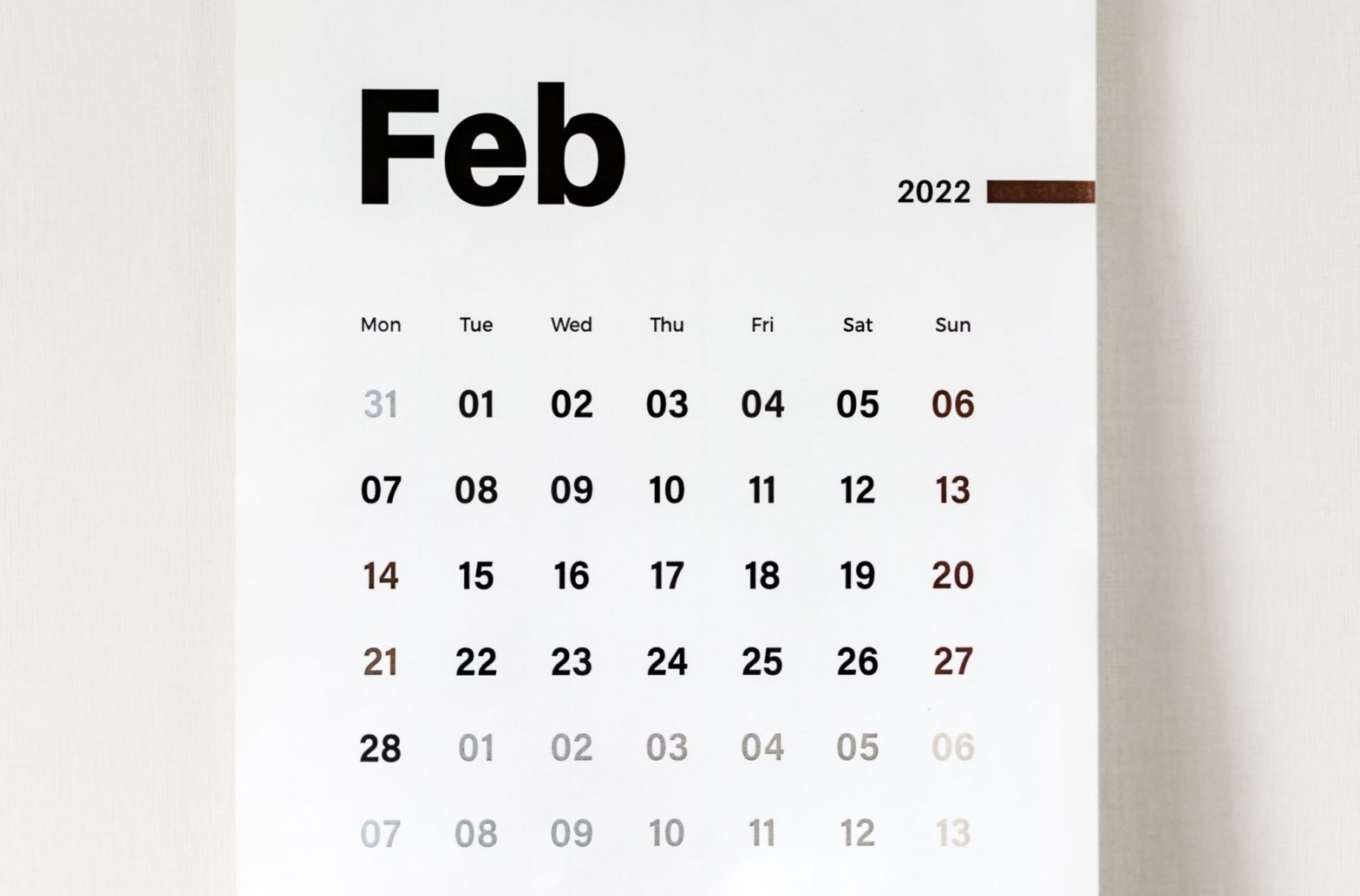 A photo of a 2022 calendar open to the month of February